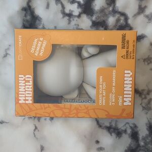 Munny World 4 inch blank vinyl DIY figure.